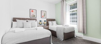 3 Triple Rooms  • Parking • Smart TVs • Work Stays