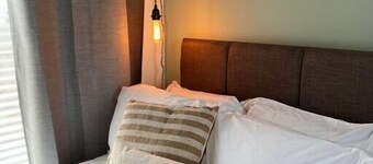 Parking • 2 Baths • Garden + Dining Area