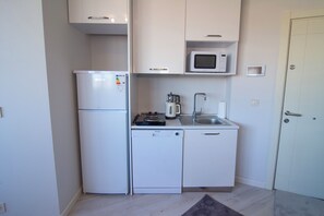 Microwave, dishwasher, dining tables
