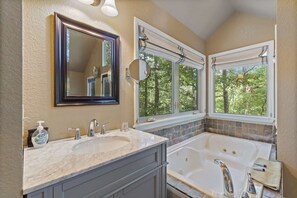 Shower, jetted tub, hair dryer, towels