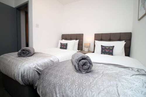 City Centre • Parking • Smart TVs in All Rooms