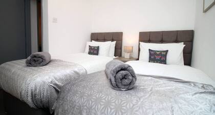 City Centre • Parking • Smart TVs in All Rooms