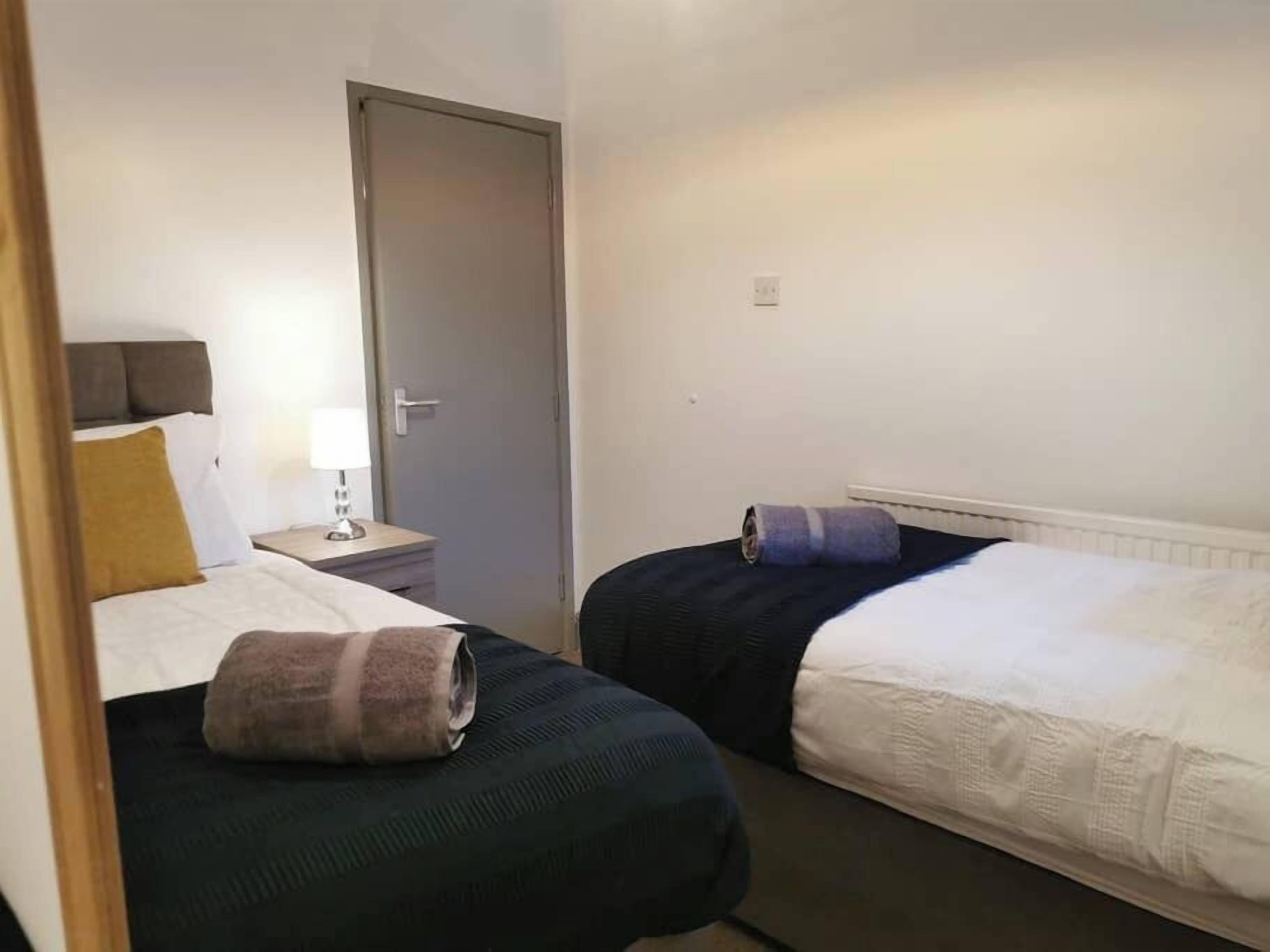 4 slaapkamers, een strijkplank/strijkijzer, gratis wifi