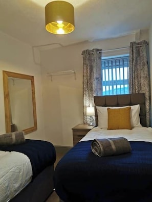4 slaapkamers, een strijkplank/strijkijzer, gratis wifi