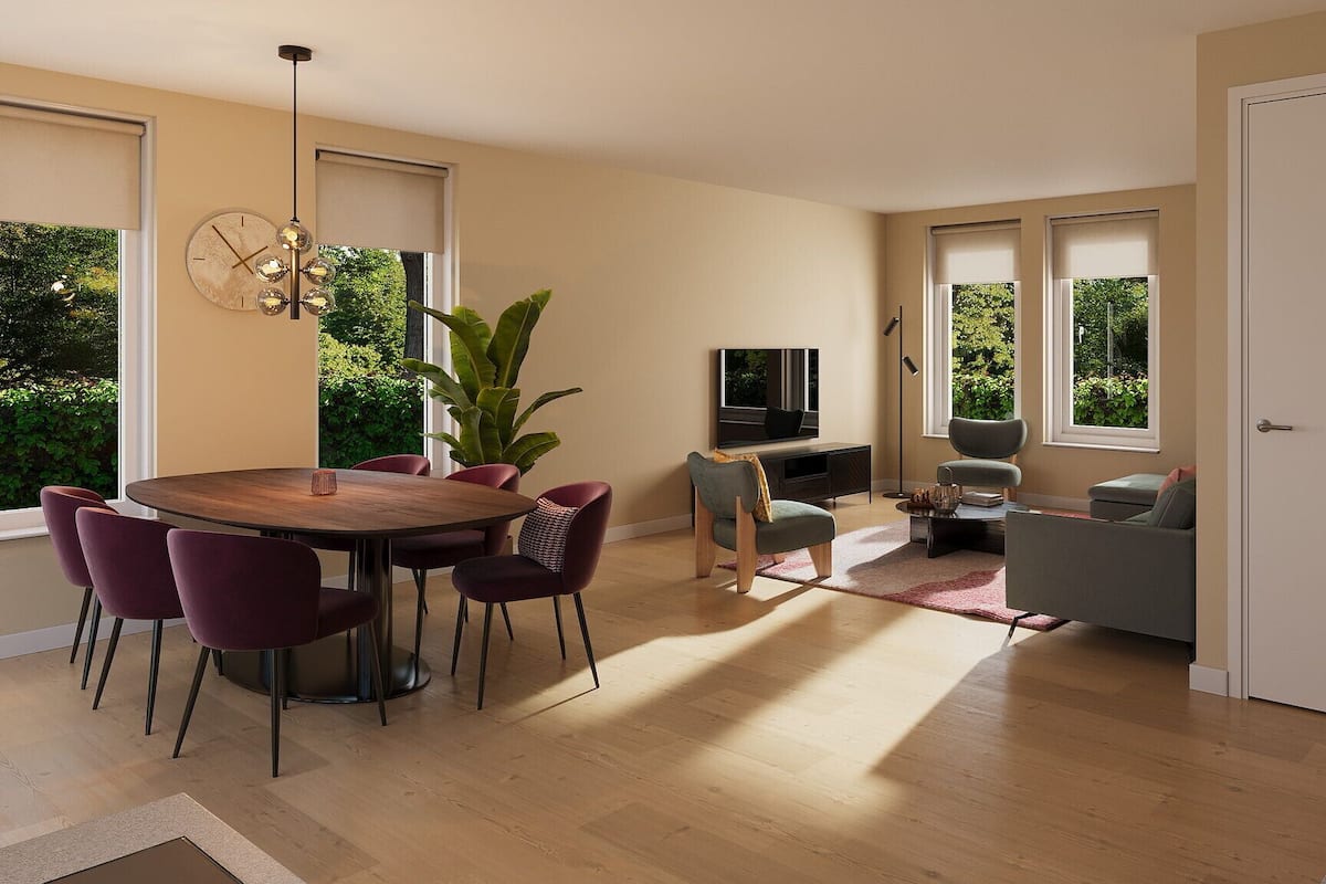 A modern living room with a dining area, a flat-screen TV, and a large window overlooking greenery.
