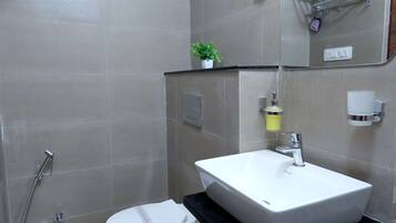 Shower, hair dryer, towels