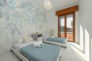 2 slaapkamers, een strijkplank/strijkijzer, gratis wifi, beddengoed