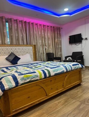 Habitación superior, vistas al jardín | Wifi gratis y ropa de cama