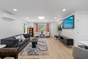 Smart TV, fireplace, foosball, books