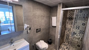 Triple Room, Private Bathroom, City View | Bathroom | Separate tub and shower, hair dryer, towels, soap