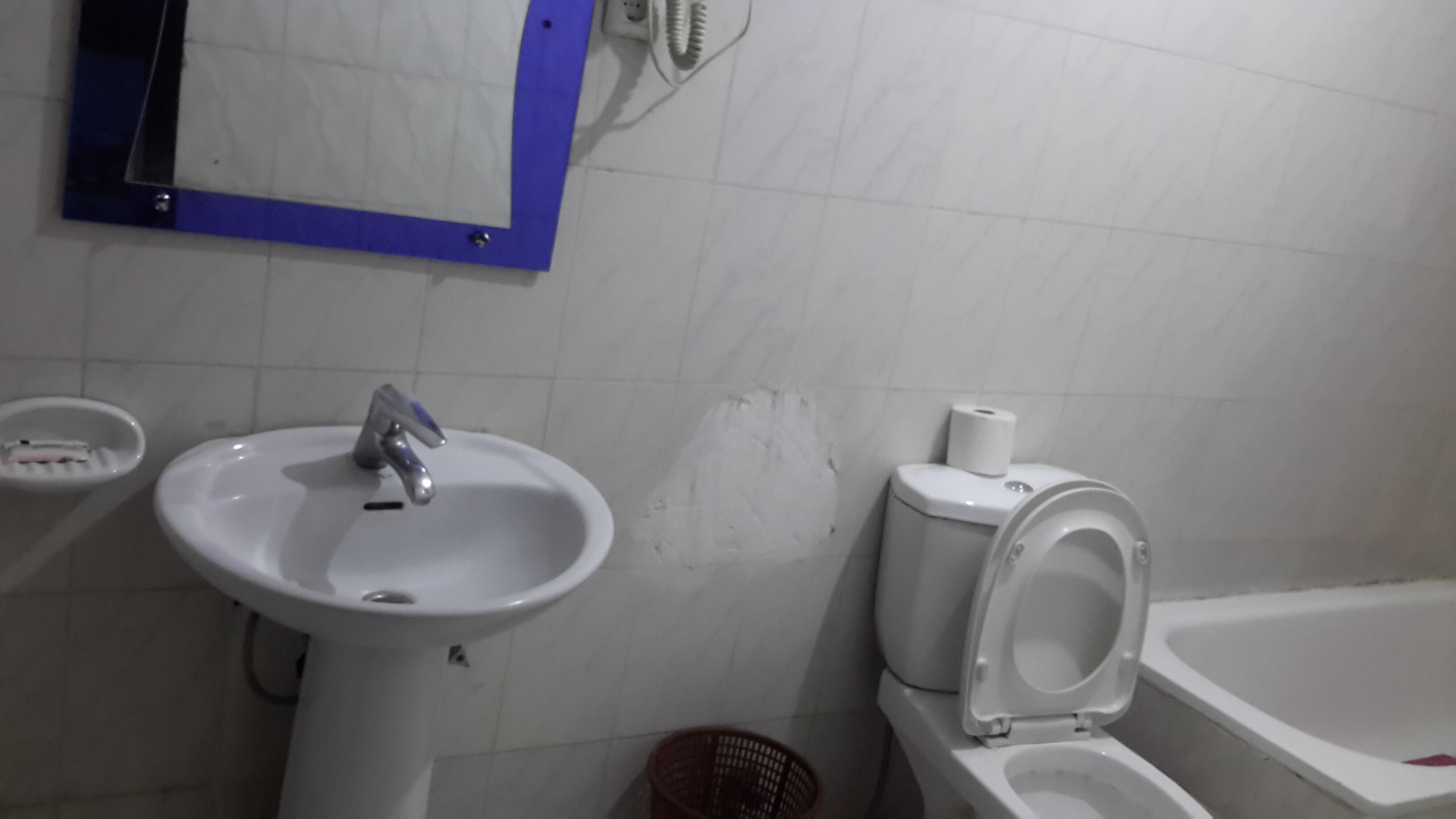 Slippers, towels, soap, toilet paper