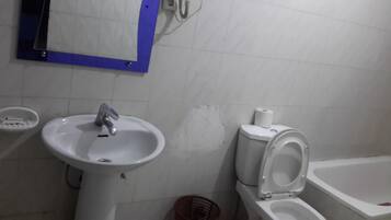 Slippers, towels, soap, toilet paper