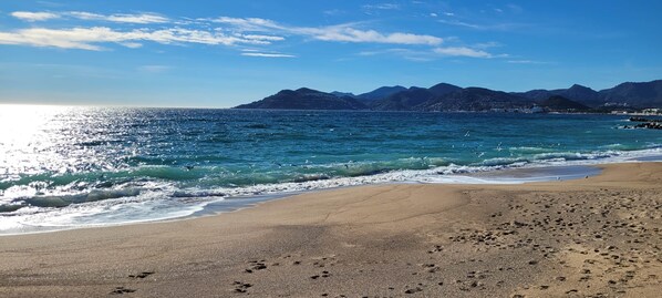 On the beach, beach towels