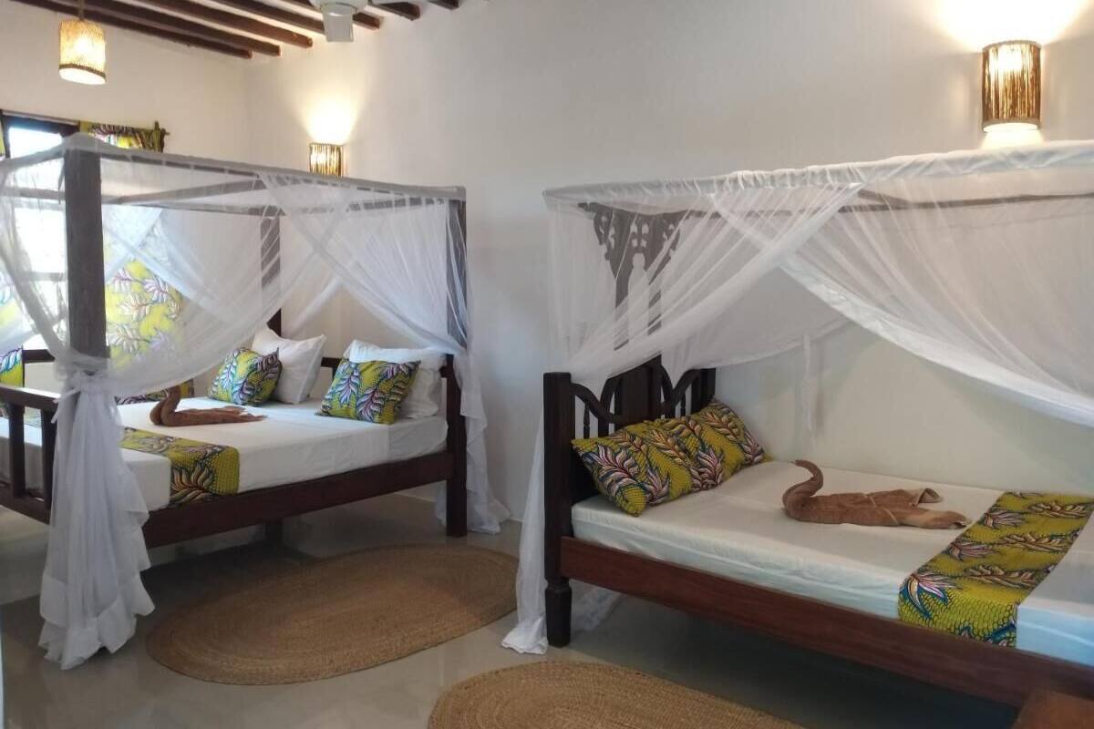 Comfort Triple Room, Garden View | Desk, laptop workspace, free WiFi