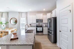 Fridge, microwave, oven, stovetop - Coastal 3BR Townhouse, Near the Beach (SANTA RSA BCH)