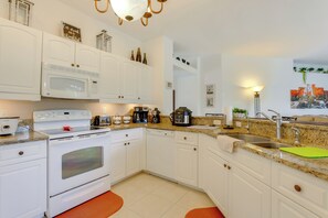 House (4 Bedrooms) | Interior - Screened Patio & Canal Views: Home in North Port! (North Port)