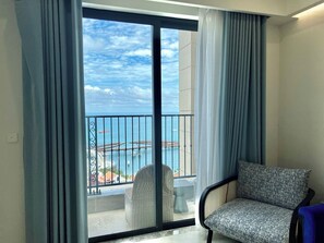 Luxury Apartment, Ocean View | Living area | 43-inch Smart TV with digital channels - Nice Seaview-Kiss bridge-Firework-Sunset (Phu Quoc)