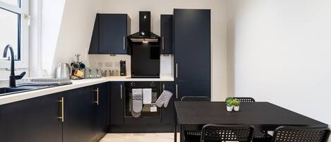 Fridge, stovetop, cookware/dishes/utensils