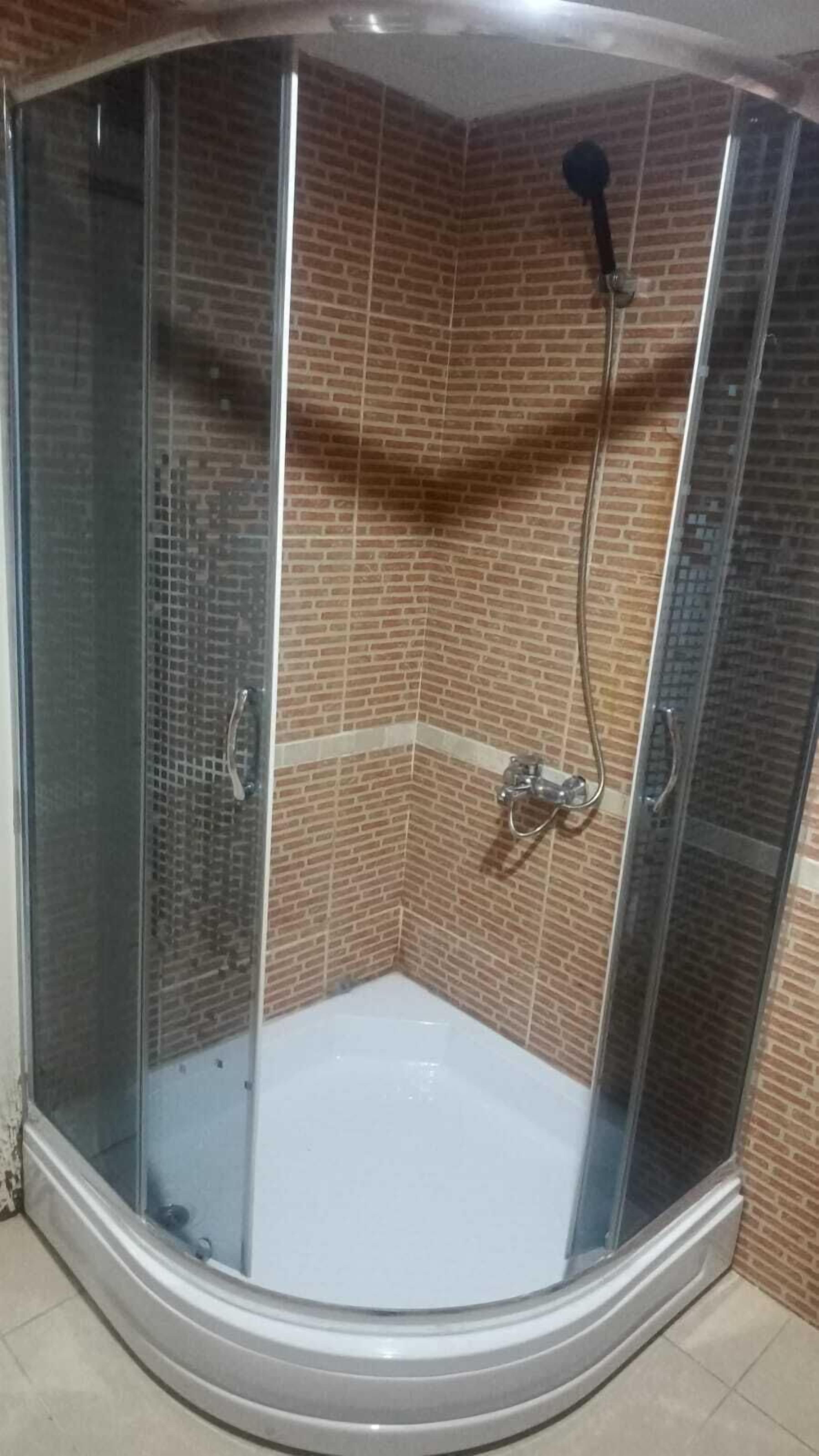 Shower, free toiletries, hair dryer, bathrobes