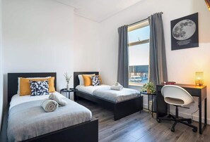 4 dormitorios, tabla de planchar con plancha, wifi y ropa de cama