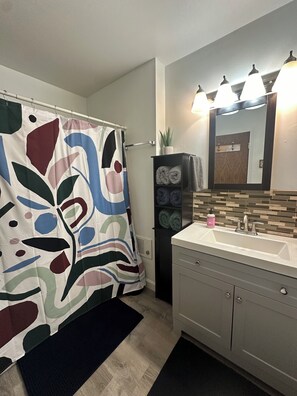 Hair dryer, towels, soap, toilet paper