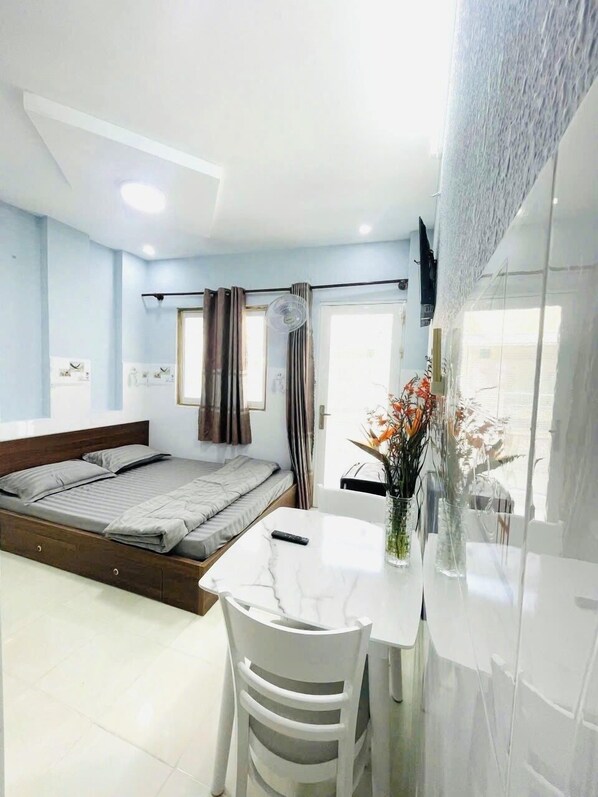 Classic Studio, City View | Minibar, individually furnished, desk, laptop workspace