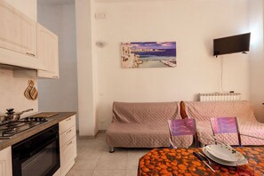 บ้านพักสแตนดาร์ด, หลายห้องนอน, 2 ห้องน้ำ (Le Torri Sul Mare 1 Centre Otranto) | บริเวณนั่งเล่น | ทีวี 21 นิ้ว พร้อมช่องเคเบิล