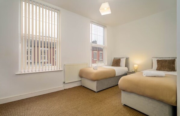 3 slaapkamers, een strijkplank/strijkijzer, gratis wifi, beddengoed