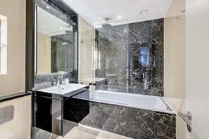 Shower, hair dryer, shampoo