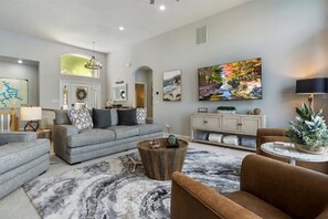 TV, fireplace, books, stereo