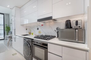 Fridge, microwave, oven, stovetop