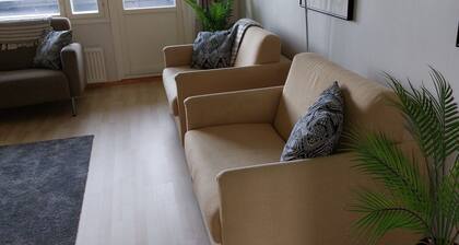 Spacious apartment with balcony and private parking in the city center.
