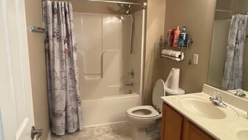 Hair dryer, towels, soap, toilet paper