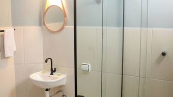 Basic Room, 1 King Bed, Private Bathroom | Bathroom | Shower, towels, soap, toilet paper