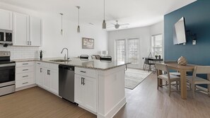 Fridge, dining tables - Landing | Stunning 1BD, Yoga Studio, Gym (Athens)