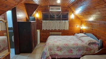 Cabana | 1 quarto, Wi-Fi de cortesia, roupa de cama
