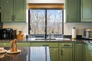 Fridge, microwave, stovetop, coffee/tea maker