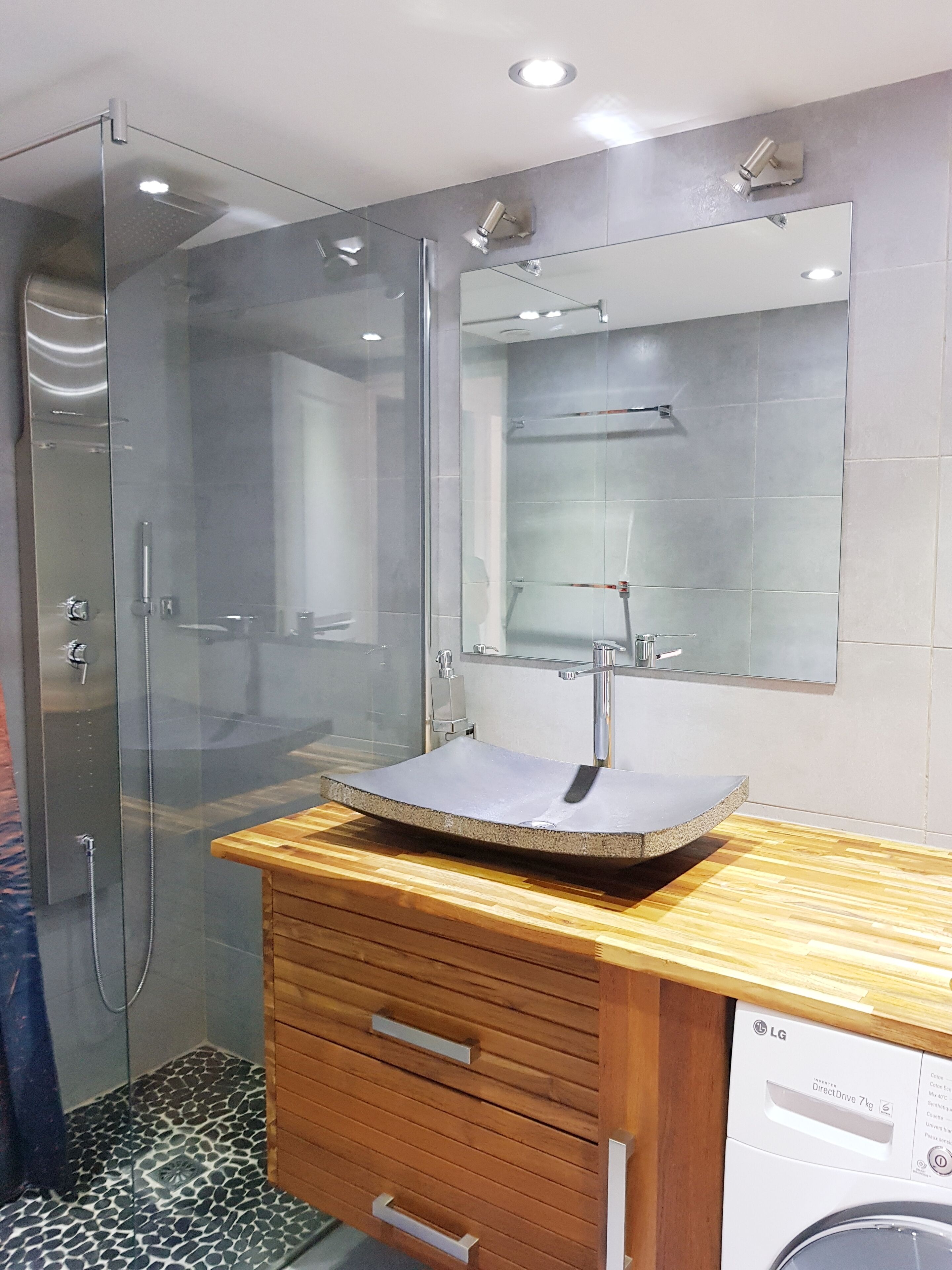 Shower, hair dryer, towels, toilet paper