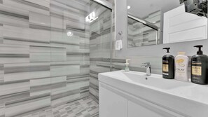Shower, hair dryer, shampoo