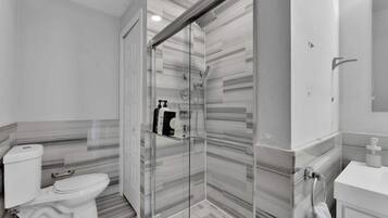 Shower, hair dryer, shampoo