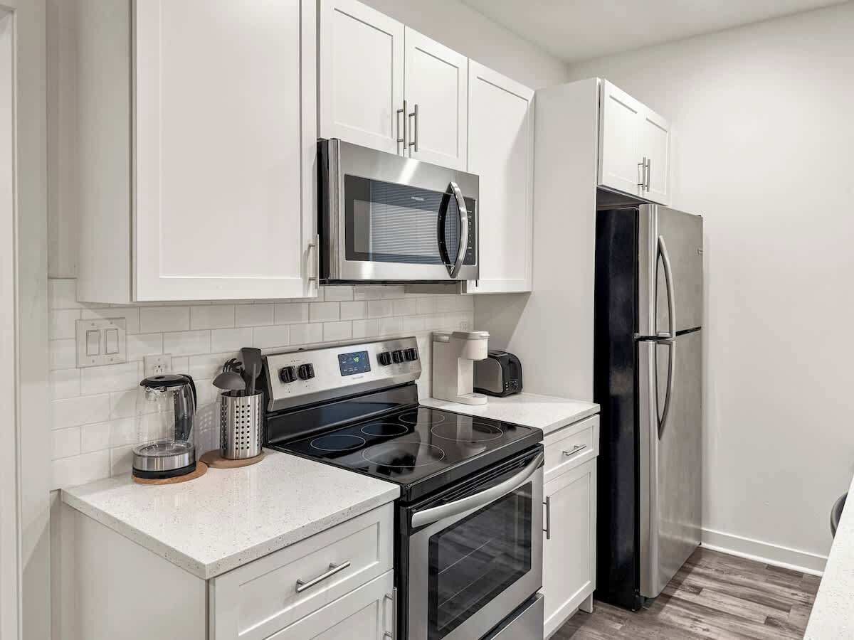 Coffee/tea maker, fridge, microwave, oven