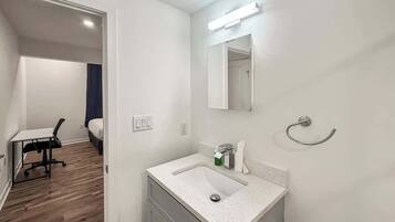 Shower, hair dryer, shampoo