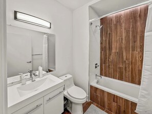 Shower, hair dryer, shampoo