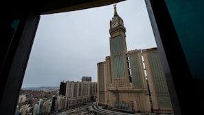 A view of a large building with a clock tower, surrounded by other high-rise buildings. - Al Massa Grand Hotel (Makkah)