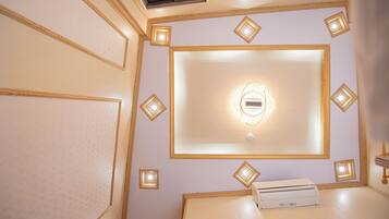 Luxury Double Room, 1 Queen Bed, Non Smoking, Mountain View | Living area | 32-inch Smart TV with digital channels, pay movies