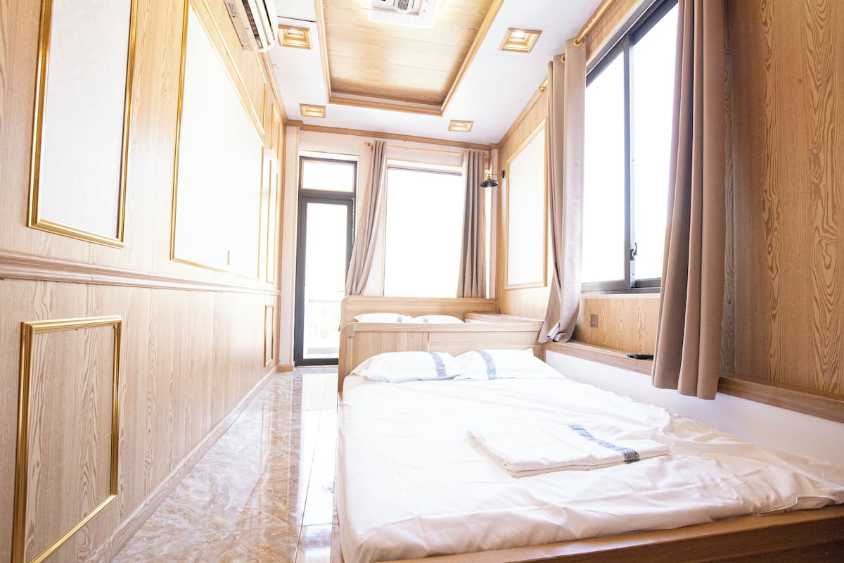 Panoramic Quadruple Room, Balcony, Mountain View | Premium bedding, down comforters, pillowtop beds, individually decorated