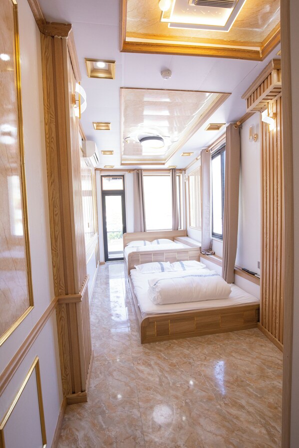 Luxe beddengoed, donsdekens, pillowtop-bedden, individueel gedecoreerd