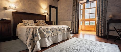 Deluxe Double Room, Garden View | Individually decorated, individually furnished, desk, free WiFi