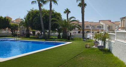 Bungalow with pool, private patio of 17m2 and terrace (Playa del Carabassi)