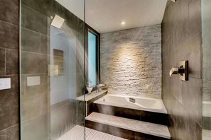 Shower, hair dryer, towels, shampoo